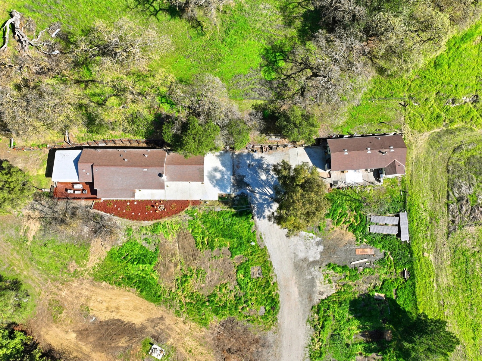 Top-down aerial of the two residences and drive