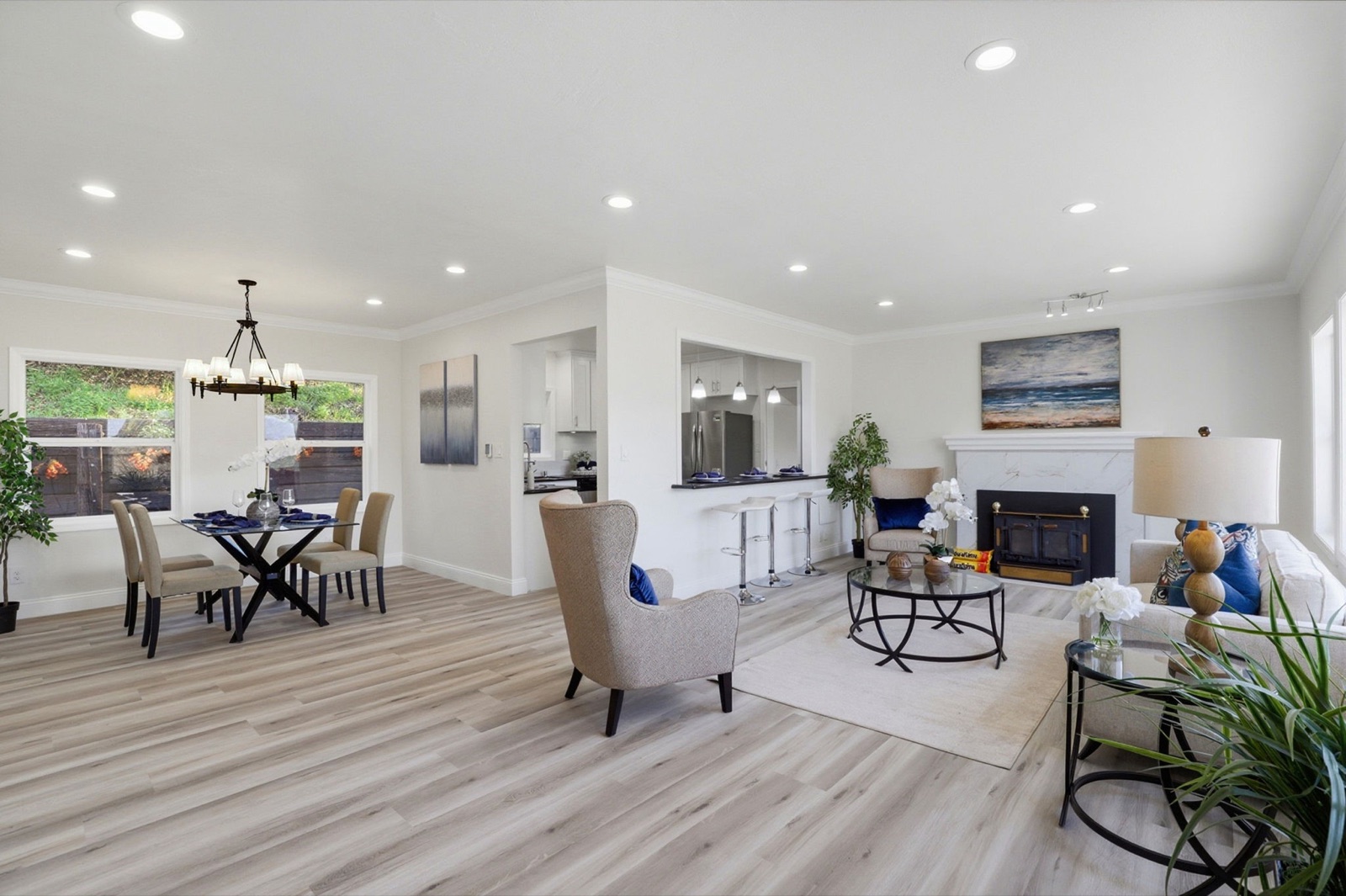 Remodeled living and dining room with fireplace